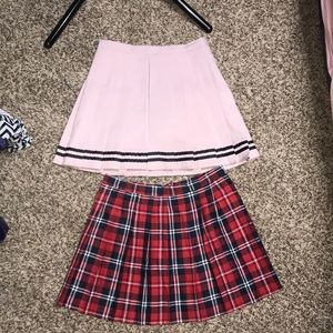 Pink skirt with black trim & a Red and blue skirt